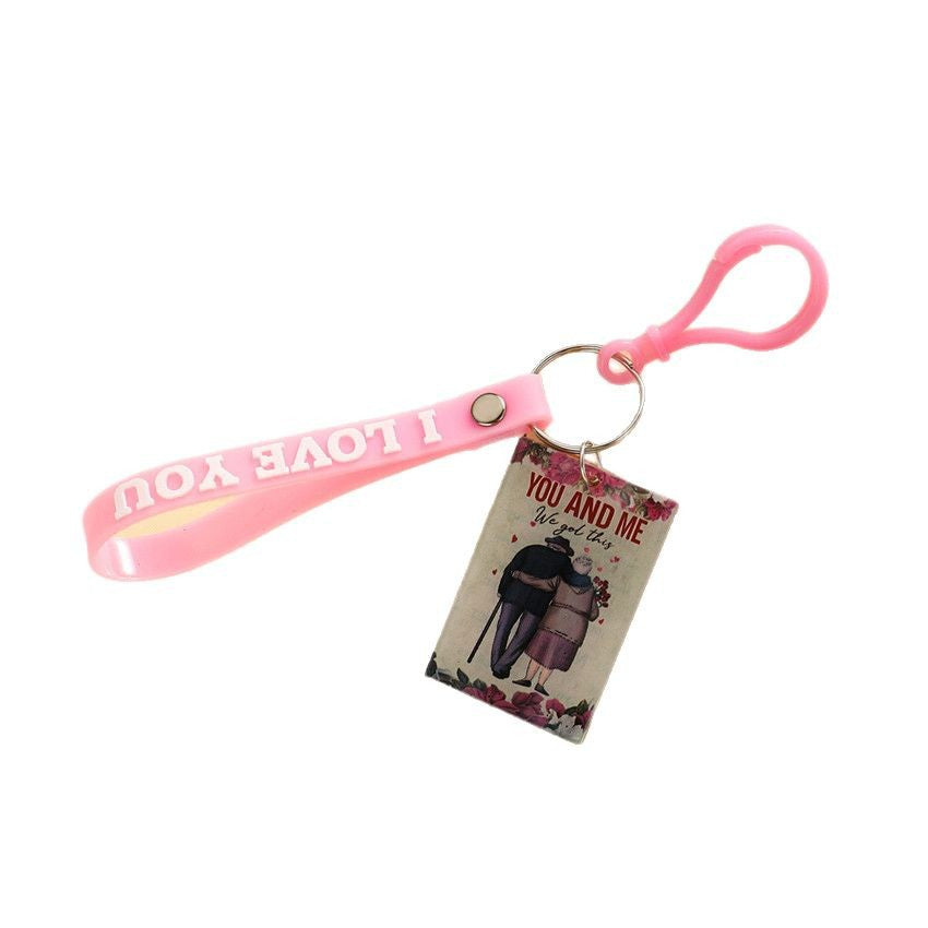 Wholesale English placard couple keychain