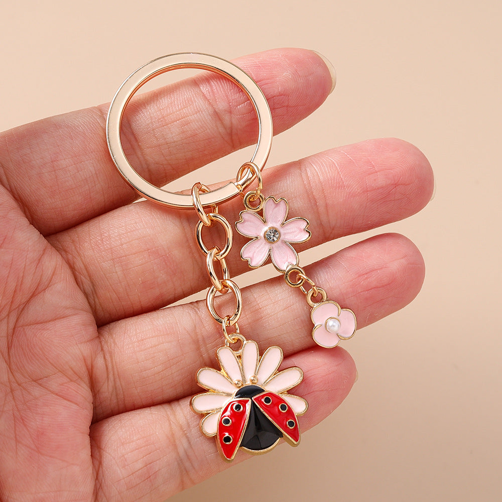 Wholesale Alloy animal and flower keychain