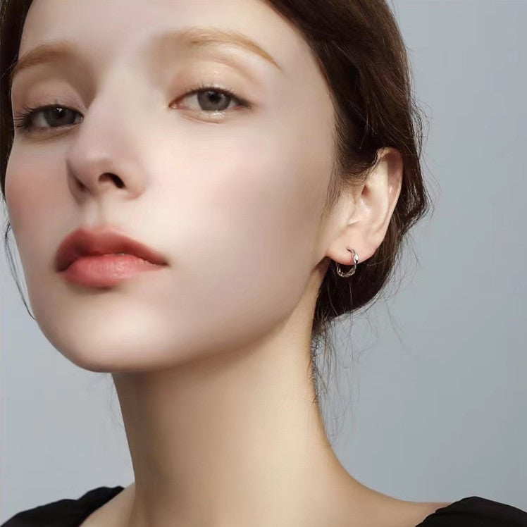 Wholesale s999 Sterling Silver Elegant Mobius Earrings Light Luxury Earrings