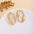 Wholesale Retro Flower Pearl Hollow Love Light Luxury Earrings