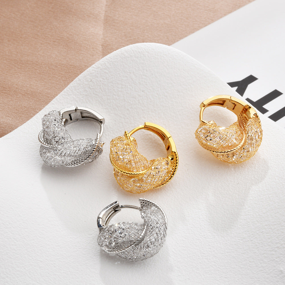 Wholesale Light luxury hollow twist earrings with glittering crystal wrap earrings