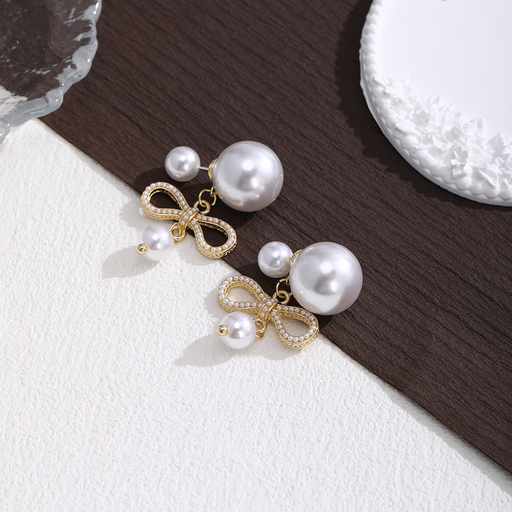 Wholesale Pearl bow pendant stud earrings