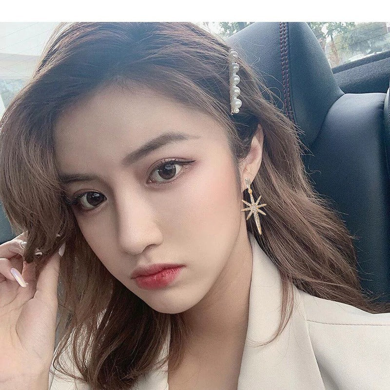 Wholesale S925 silver needle shooting star eight-pointed star earrings