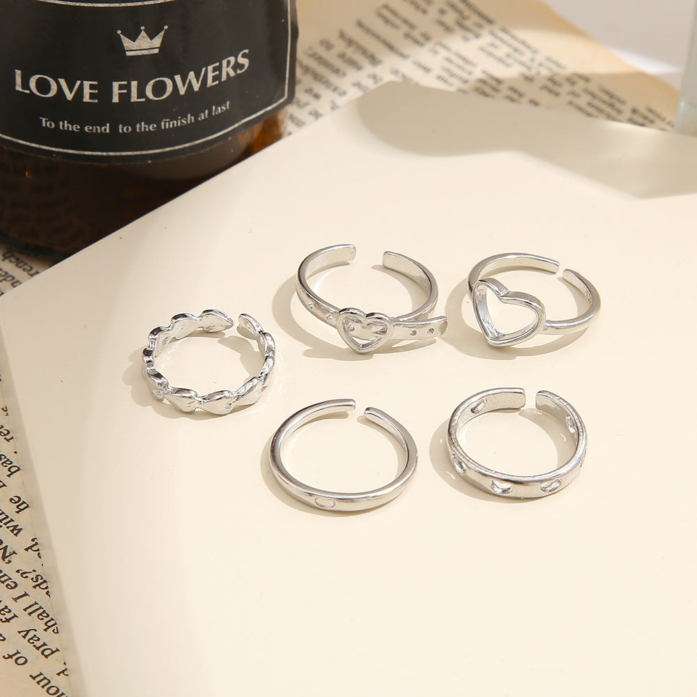 Wholesale Heart-shaped 5-piece openwork ring set