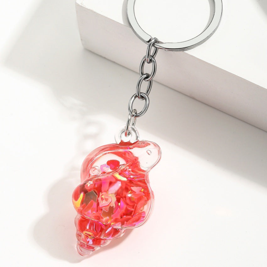 Wholesale Trendy Blue Acrylic Sea Shell Flowing Sand Keychain Charm Fashion Bag Decoration Creative Gift For Any Ocn