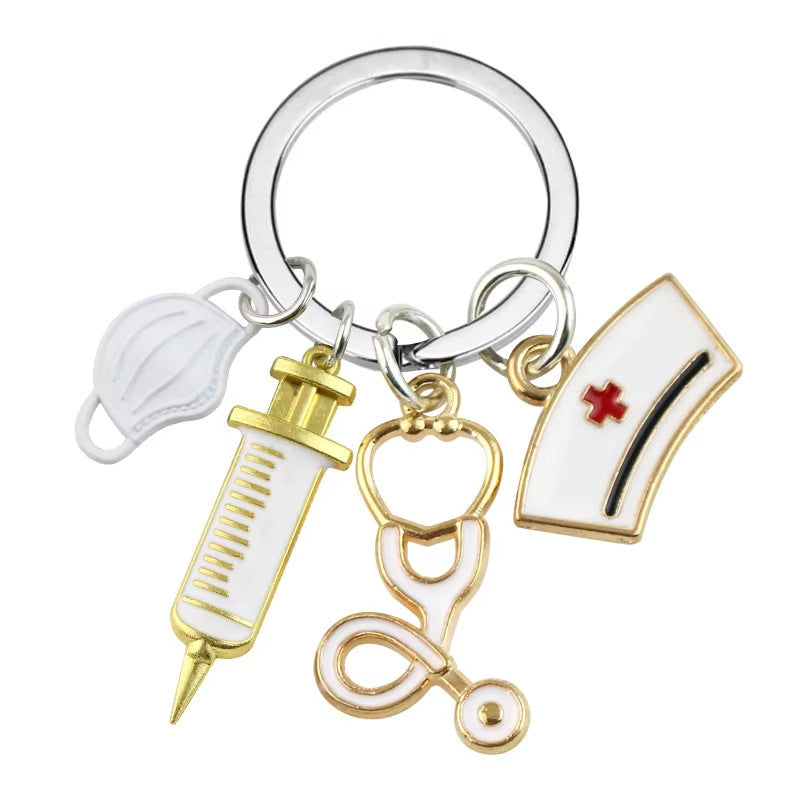 Wholesale Metal Nurse Medical Keychain Pink Stethoscope Cross Design Gift Bag Charm Decorative Accessory