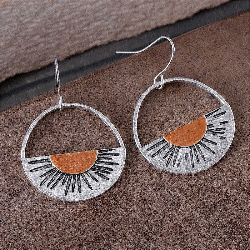 Wholesale  creative orange semicircle hollow sunset earrings