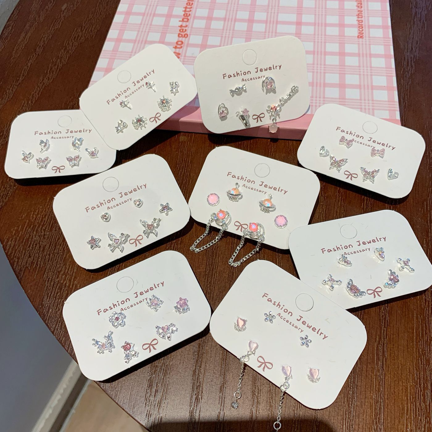 Wholesale Sweet and cool pink zircon butterfly earrings silver needle small daily sparkling all-match earrings