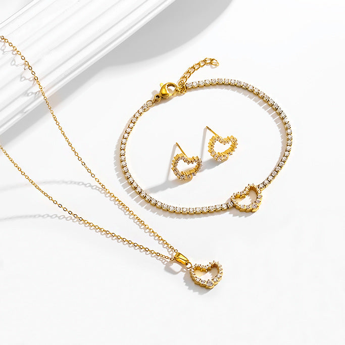 Wholesale Titanium steel heart-shaped necklace earrings and bracelet set inlaid with zircon.