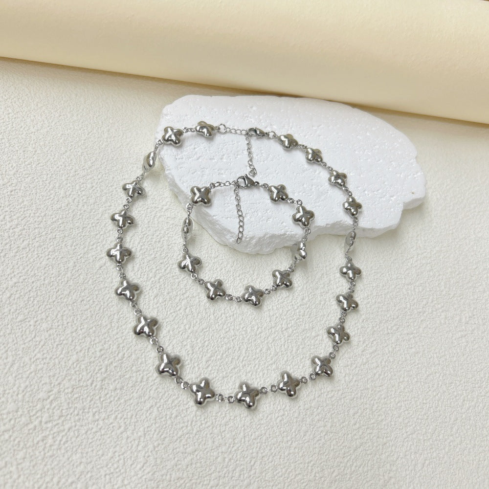 Wholesale  three-dimensional hollow stars love cross snowflake four-leaf clover necklace bracelet