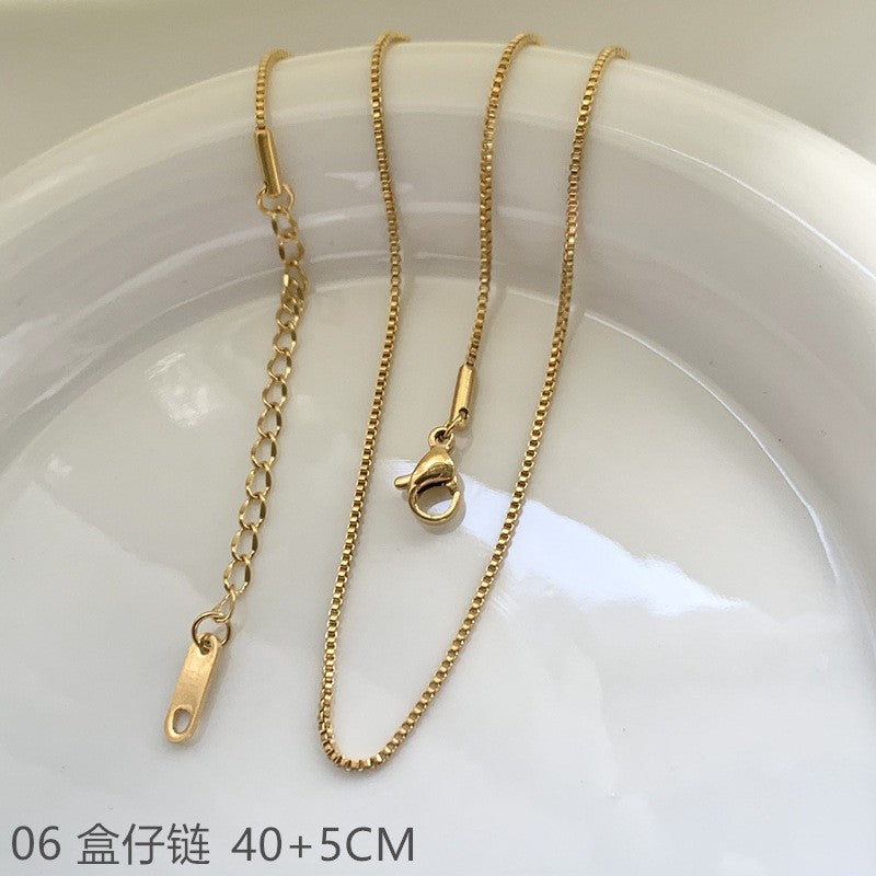Wholesale Cross chain box chain snake bone chain titanium steel plated 24k golden sunflower clavicle chain