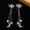 Wholesale exaggerated moon inlaid zircon silver needle earrings