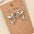 Wholesale Alloy Bow Creative Earrings