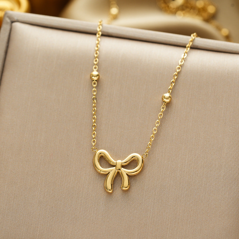 Wholesale Titanium Steel Gold Bow Pendant Necklace - Fashion Accessory for Boutique Resale