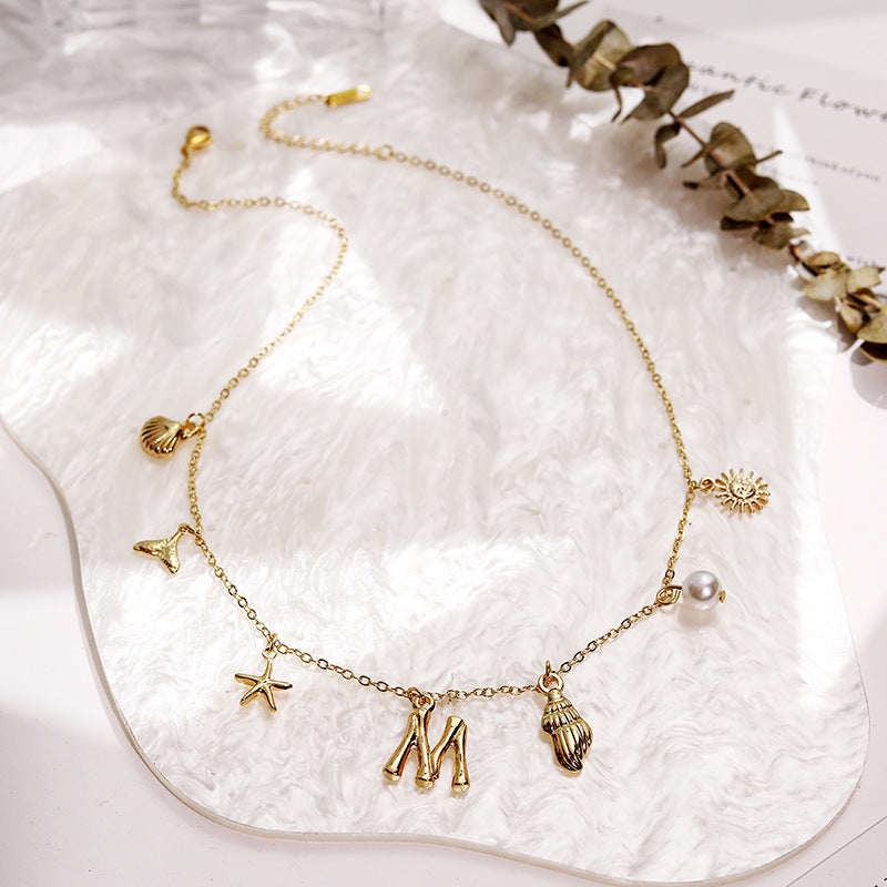 Wholesale Bohemian Shell Starfish Gold Electroplated Copper Alphabet Pendant Necklace for Women Fashion Accessory