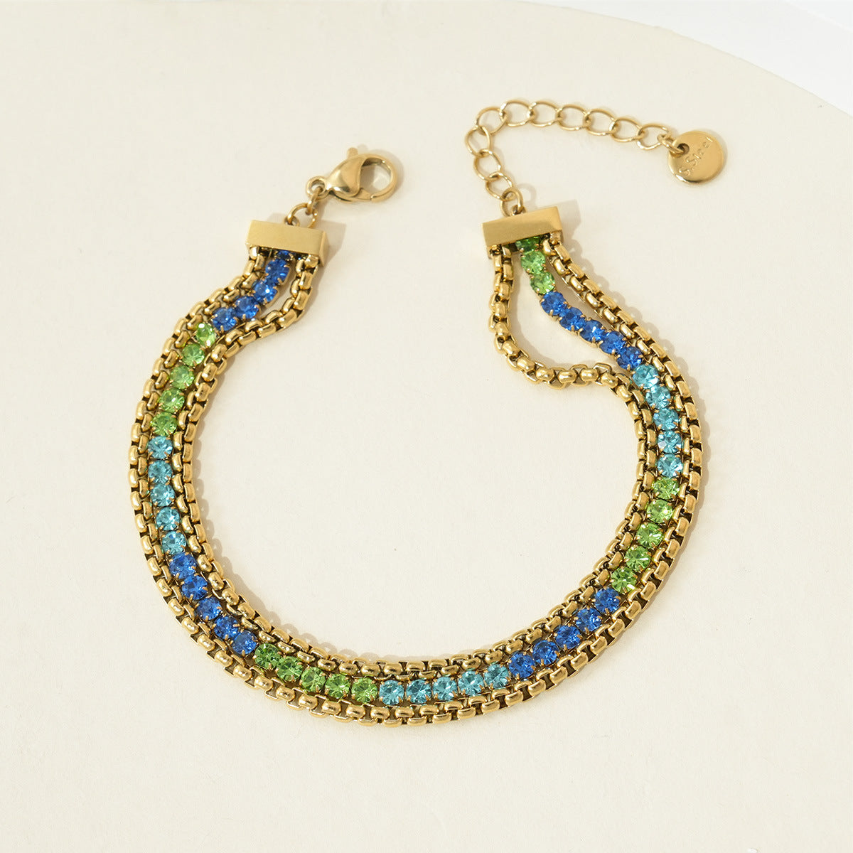 Wholesale Stainless steel bracelet with multiple layers and diamond embellishments.