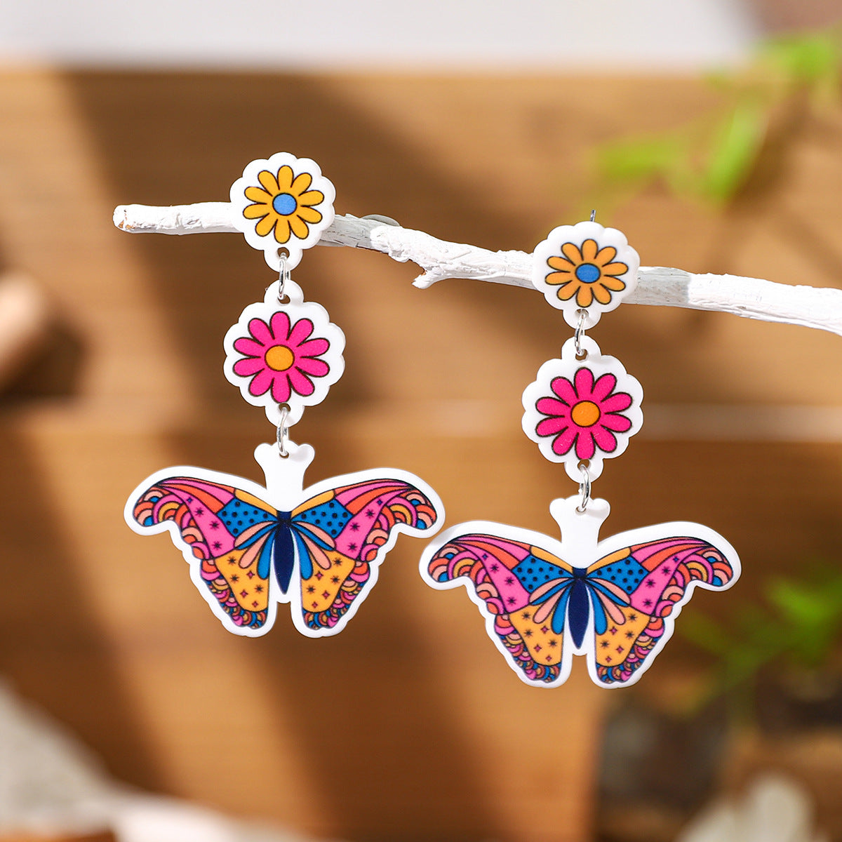 Wholesale Brilliant painted acrylic  butterfly contrast color earrings