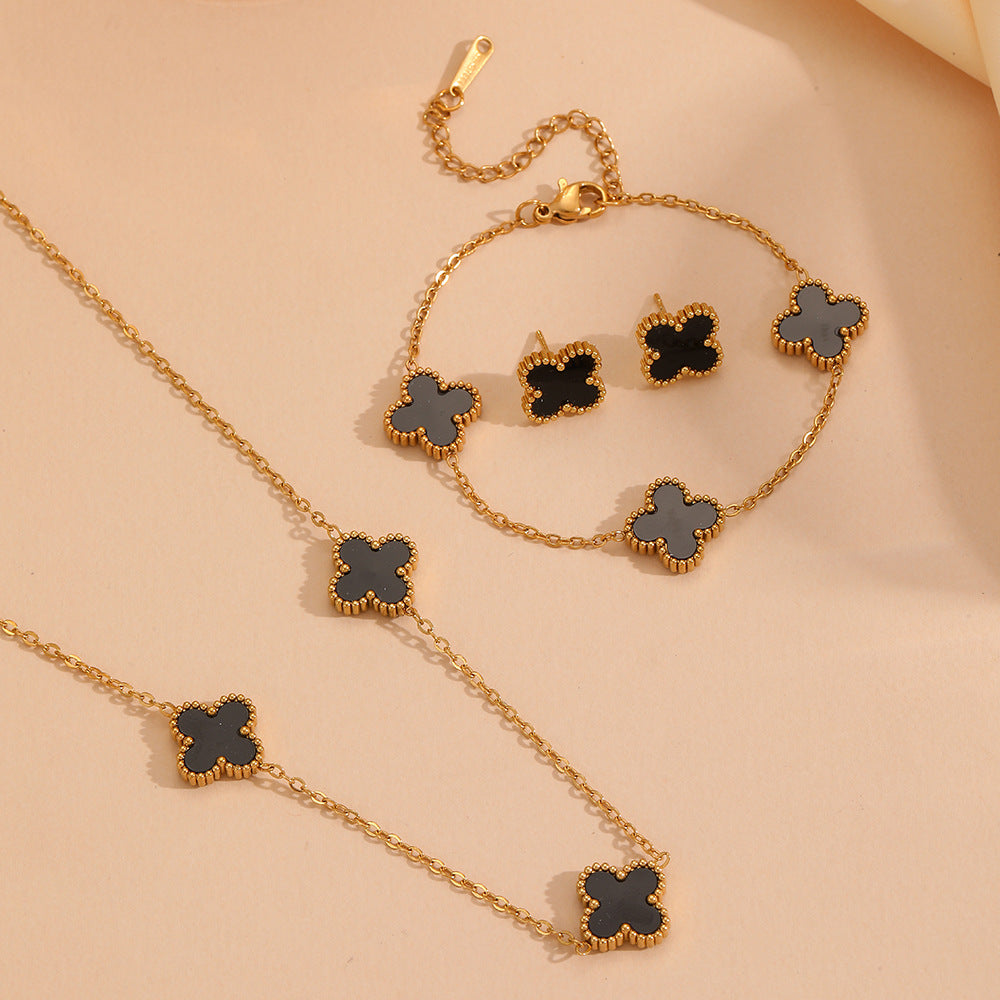 Wholesale Fashion stainless steel three four-leaf flower jewelry new titanium steel does not fade small flower jewelry suit