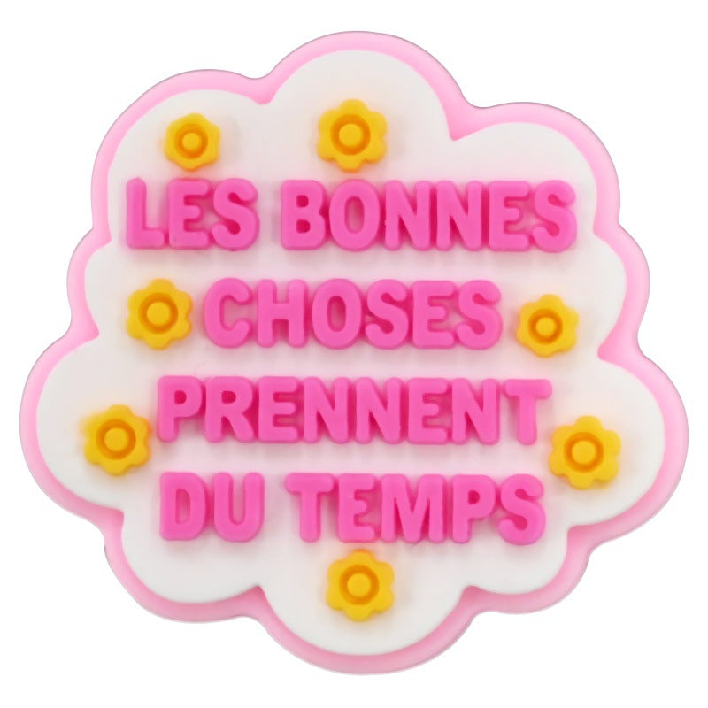 Serie di frasi francesi casuali all'ingrosso da 100 pezzi di cartoni animati di zoccoli Decorazione con fibbia per scarpe in gomma morbida in PVC