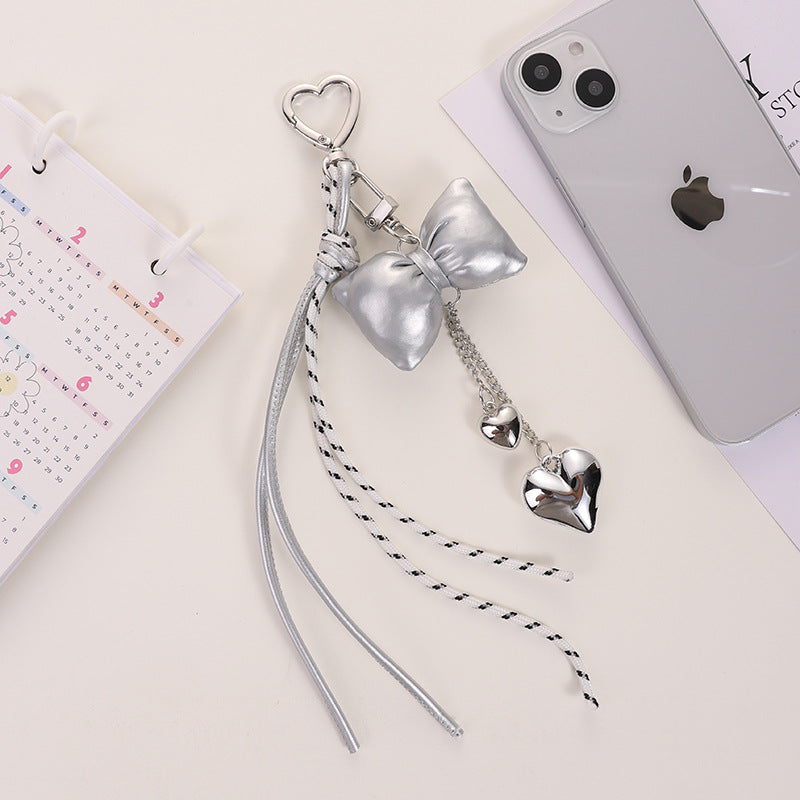 Wholesale Leather cord bow tassel keychain