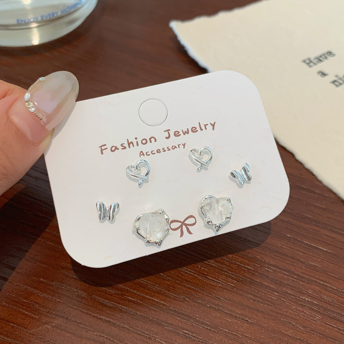 Wholesale Broken shells cat starfish earrings set silver needle heart bow earrings