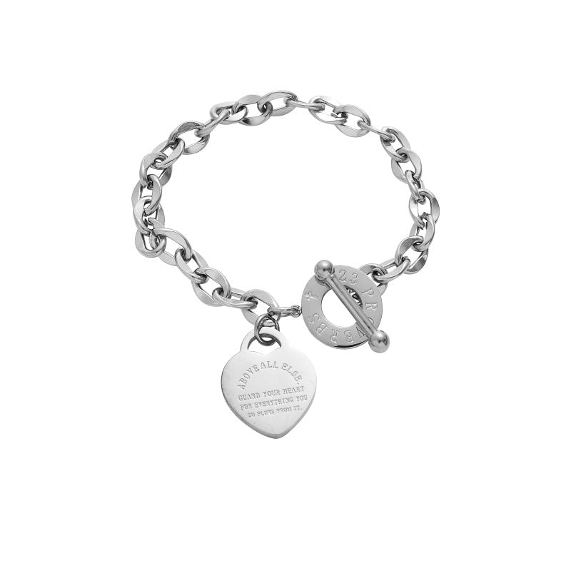 Bracciale con lettera inglese a forma di cuore in titanio otbuckle all'ingrosso