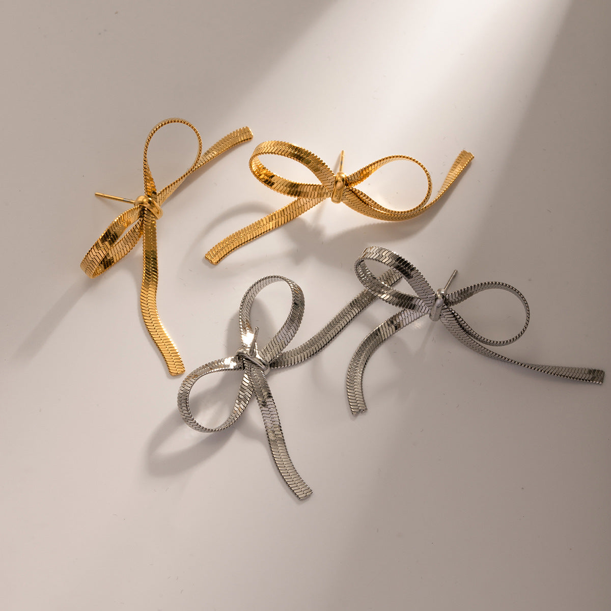 Wholesale 18k Gold Stainless Steel Earrings Flat Snake Chain Bow Earrings ACC-ES-Wanx001