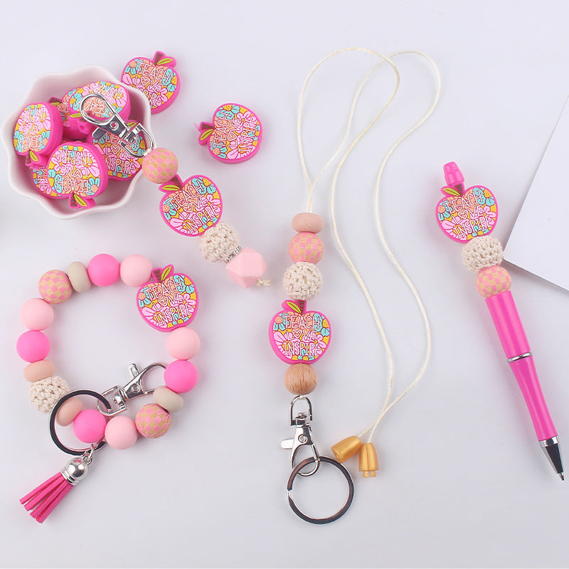 Wholesale Cartoon Apple Silicone Beads Accessories Pendant Creative DIY Silicone Four-Piece Combination Wrist Keychain Jewelry