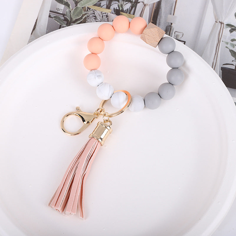 Wholesale Trendy Silicone Bead Bracelet With Tassel Wooden Bead Keychain Natural Geometry Style Chic Jewelry Accessory Gift