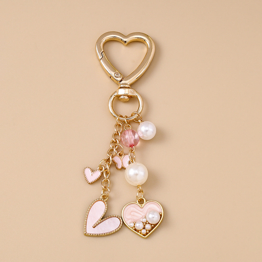 Wholesale Alloy Pearl Heart Flower Butterfly Keychain