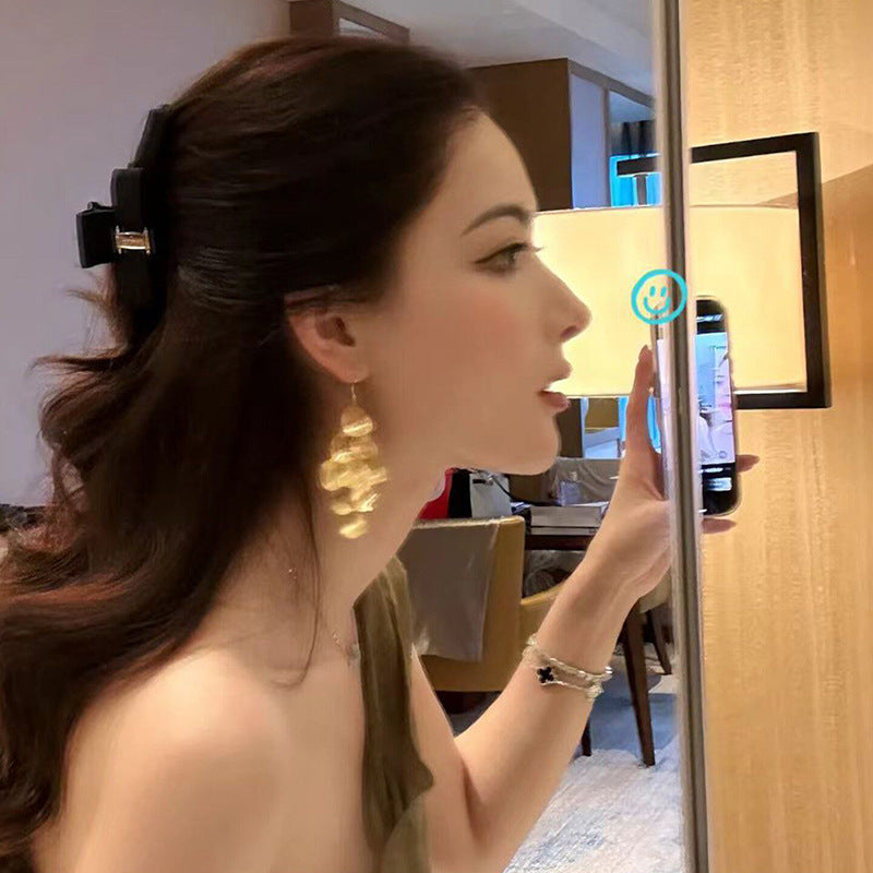 Wholesale Vintage Gold Hollow Petal Tassel Earrings - Trendy Jewelry Accessory for Everyday Wear