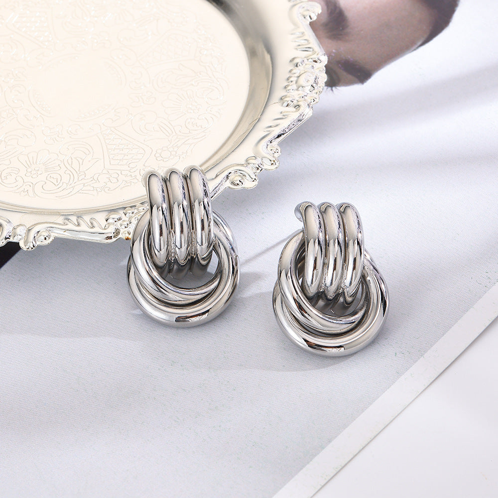 Wholesale geometric exaggerated smooth hollow tube winding earrings