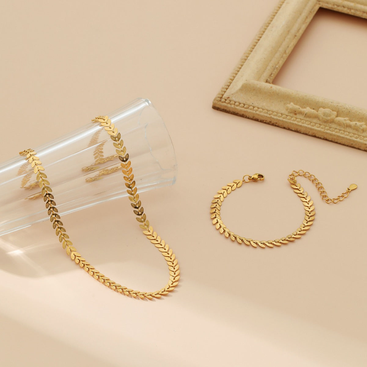 Wholesale stainless steel 18k gold rice ear simple necklace bracelet suit