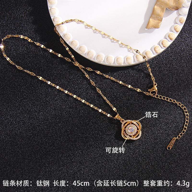 Wholesale Zircon Rotating Four Leaf Clover Flower Pendant Titanium Steel Necklace ACC-NE-Rongc006