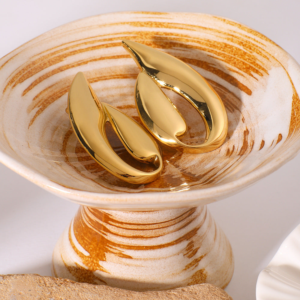 Großhandel, tropfenförmige geometrische Skorpion, hohlförmige Edelstahlohrringe