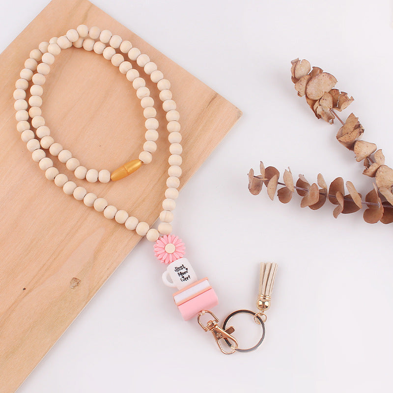 Wholesale Wooden Bead Necklace Keychain Silicone Daisy Book Beaded Tassel Necklace