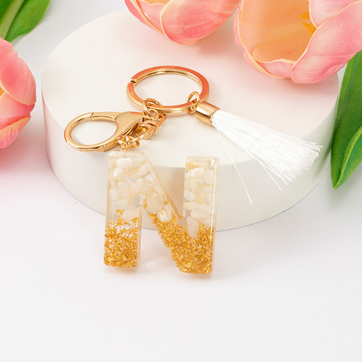 Wholesale Gold Foil New Resin Crystal Glue White Tassel Color English Digital Keychain