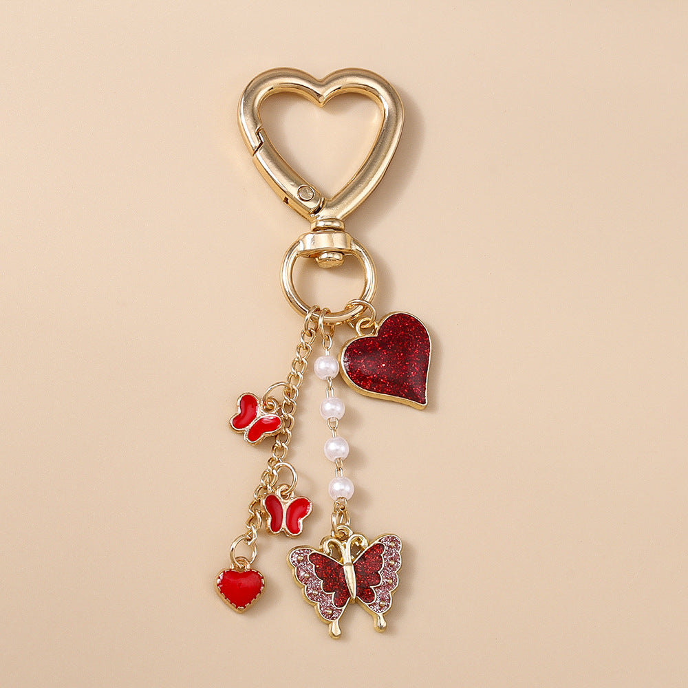 Wholesale Alloy pearl butterfly keychain heart and flower keychain