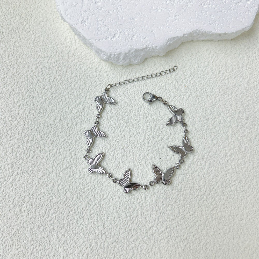 Wholesale  stainless steel three-dimensional hollow butterfly bracelet necklace suit