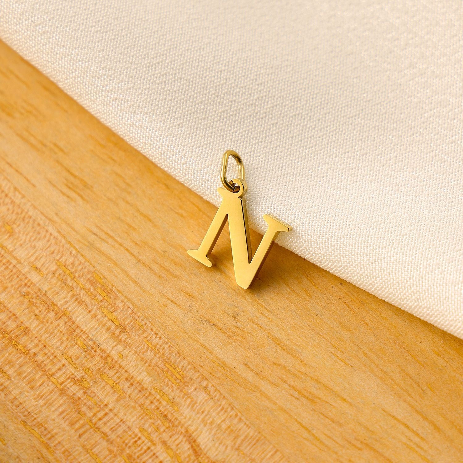 Wholesale Titanium steel letter pendant