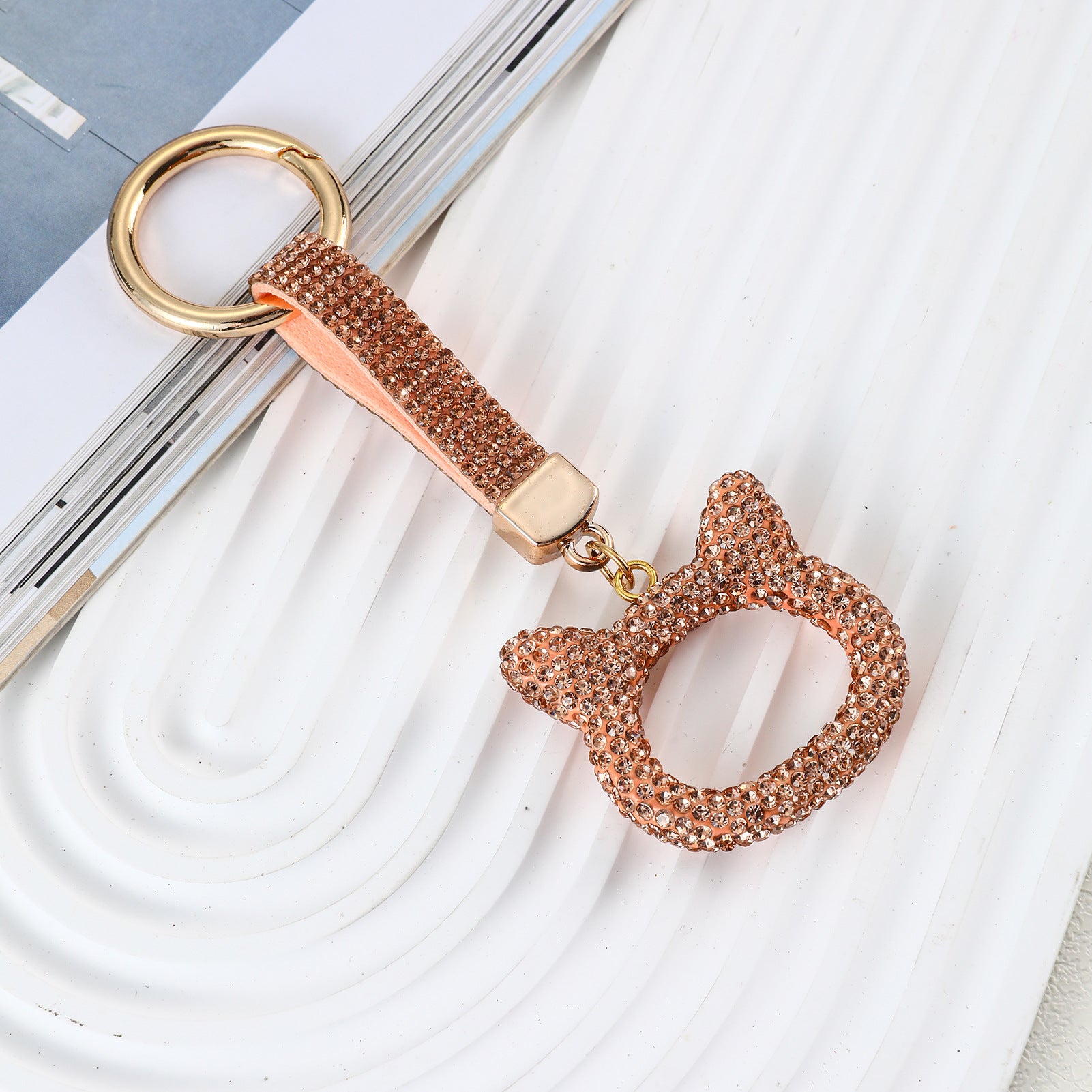 Wholesale hollowed-out cat head keychain