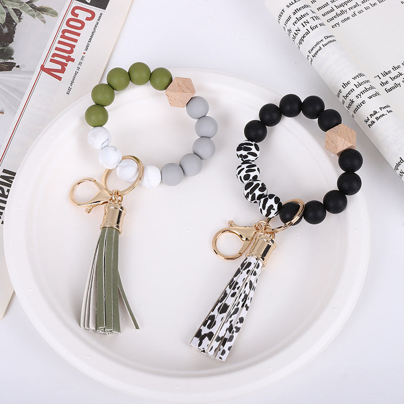 Wholesale Trendy Silicone Bead Bracelet With Tassel Wooden Bead Keychain Natural Geometry Style Chic Jewelry Accessory Gift