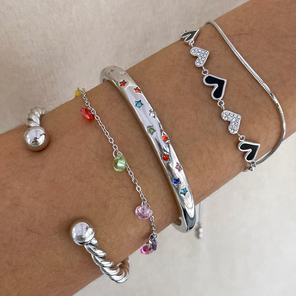 Wholesale Stainless steel colored diamond five-pointed star love pull bracelet