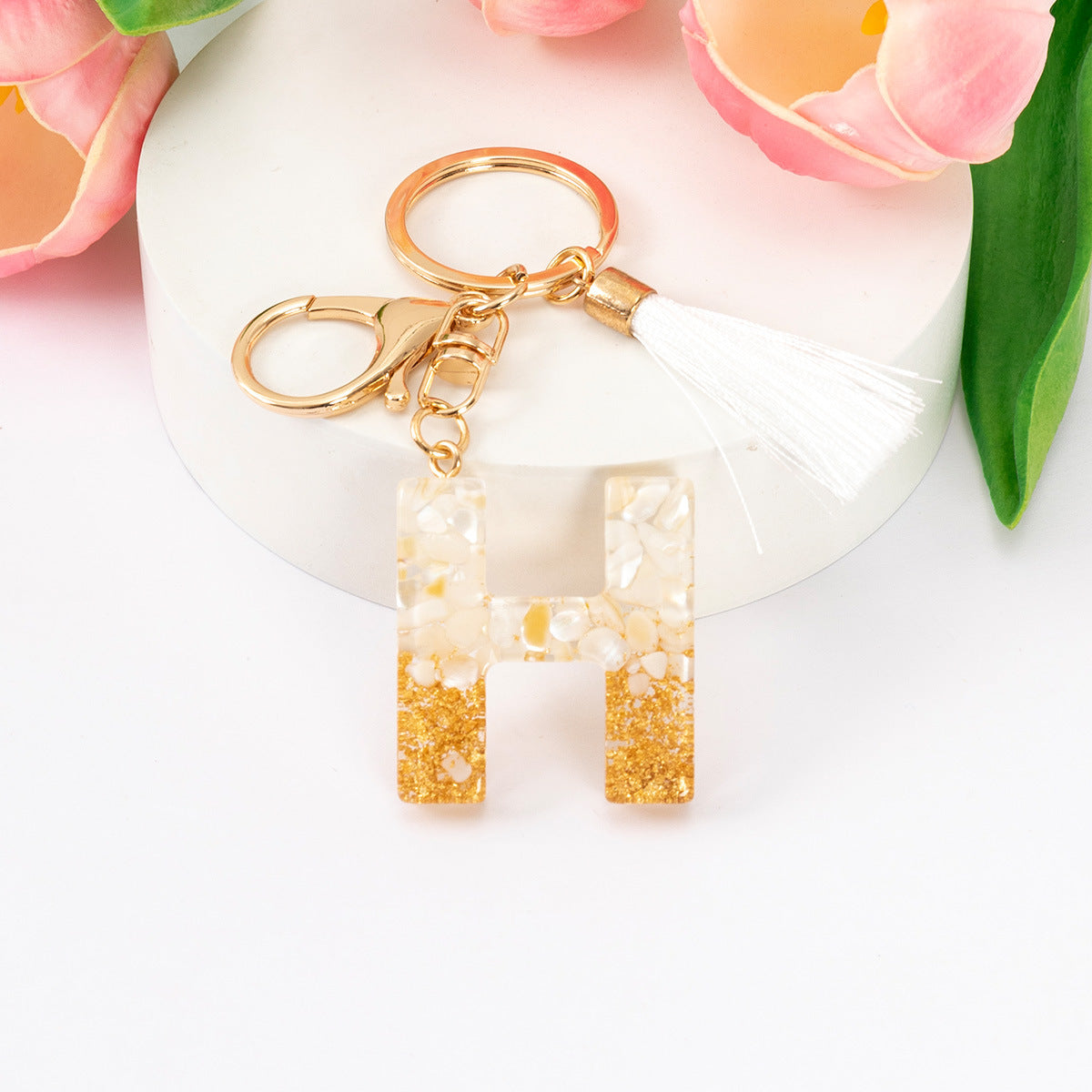 Wholesale Gold Foil New Resin Crystal Glue White Tassel Color English Digital Keychain