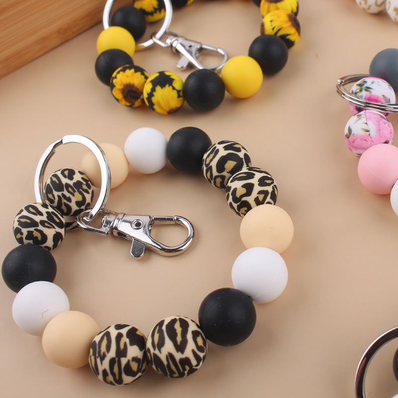 Wholesale Cow Pattern Sunflower Pattern Silicone Beaded Wrist Keychain ACC-KC-GuangTian024