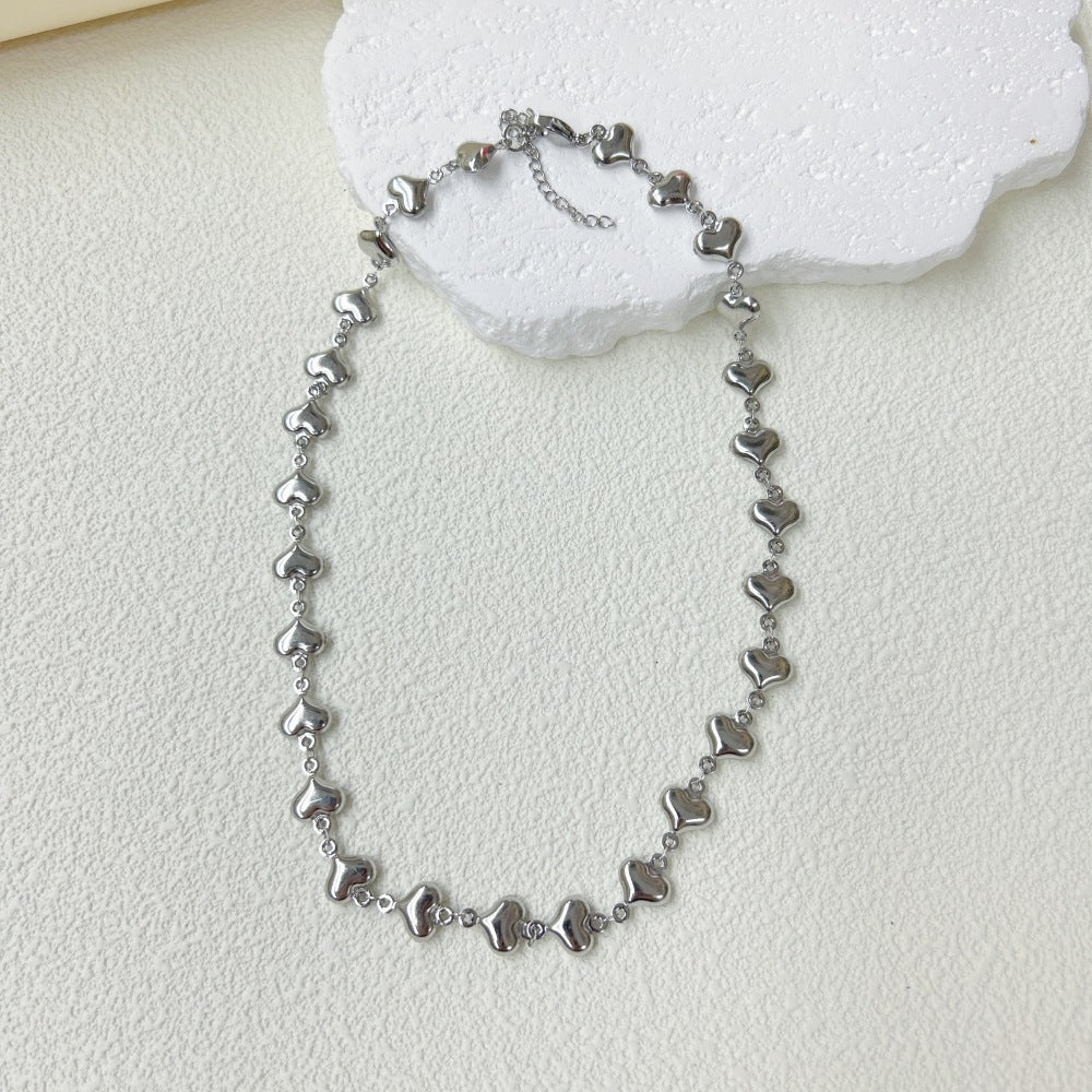 Wholesale Stainless Steel Three-dimensional Hollow Love Bracelet Necklace suit