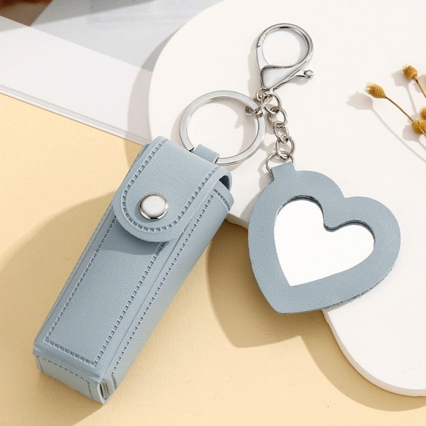 Wholesale creative leather pendant portable lipstick bag keychain makeup mirror mini key storage bag