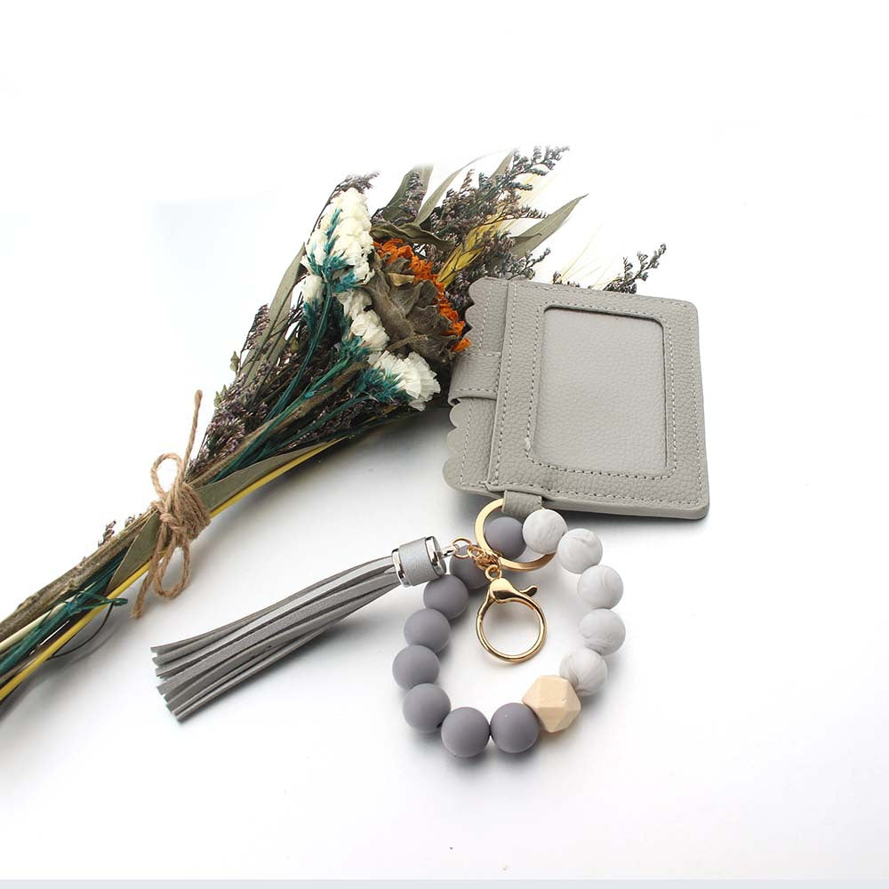 Wholesale Silicone PU Leather Tassel Bracelet Wooden Beads Wallet Keychain ACC-KC-JinAn023