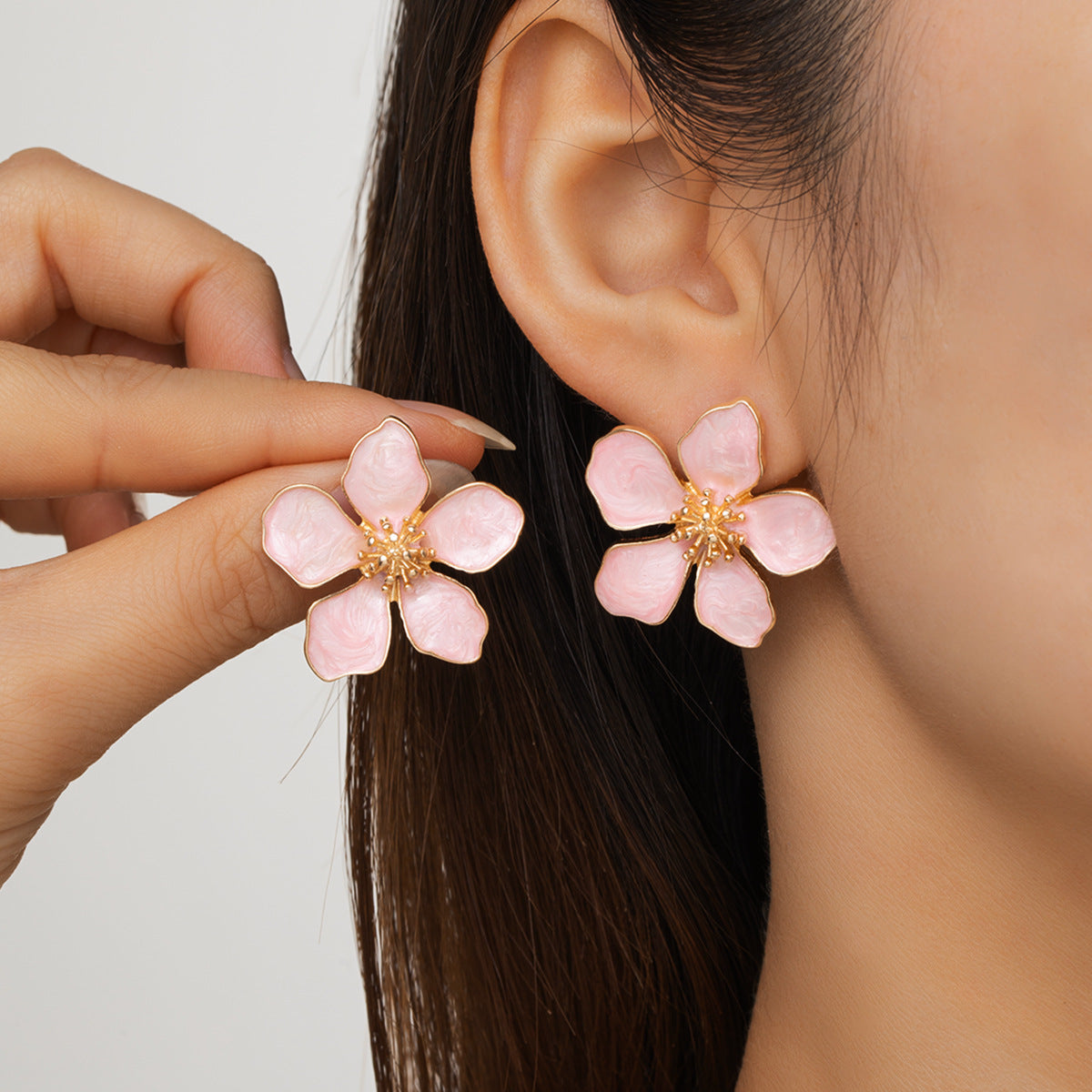 Wholesale Alloy Oil-Dropping Three-Dimensional Flower Earrings