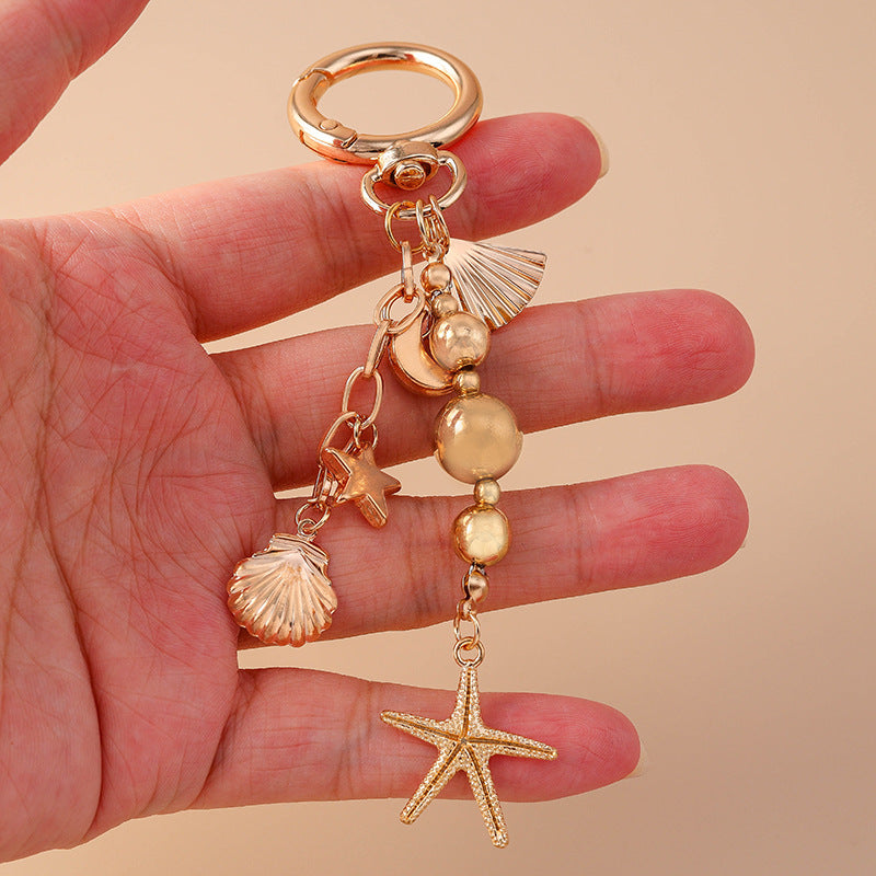 Wholesale Alloy Moon Star Star Pearl Beaded Heart Keychain